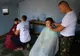 Copiii sunt așteptați la ”frizeria” din curtea Bisericii Militare din Focșani, înainte de începerea anului școlar