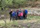 FOTO   Copiii și jandarmii populează cu păstrăv apele din Parcul Natural Putna